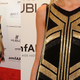 Illustration for article titled Fashion Week Begins, and Lindsay Lohan Is a Stain on the Red Carpet